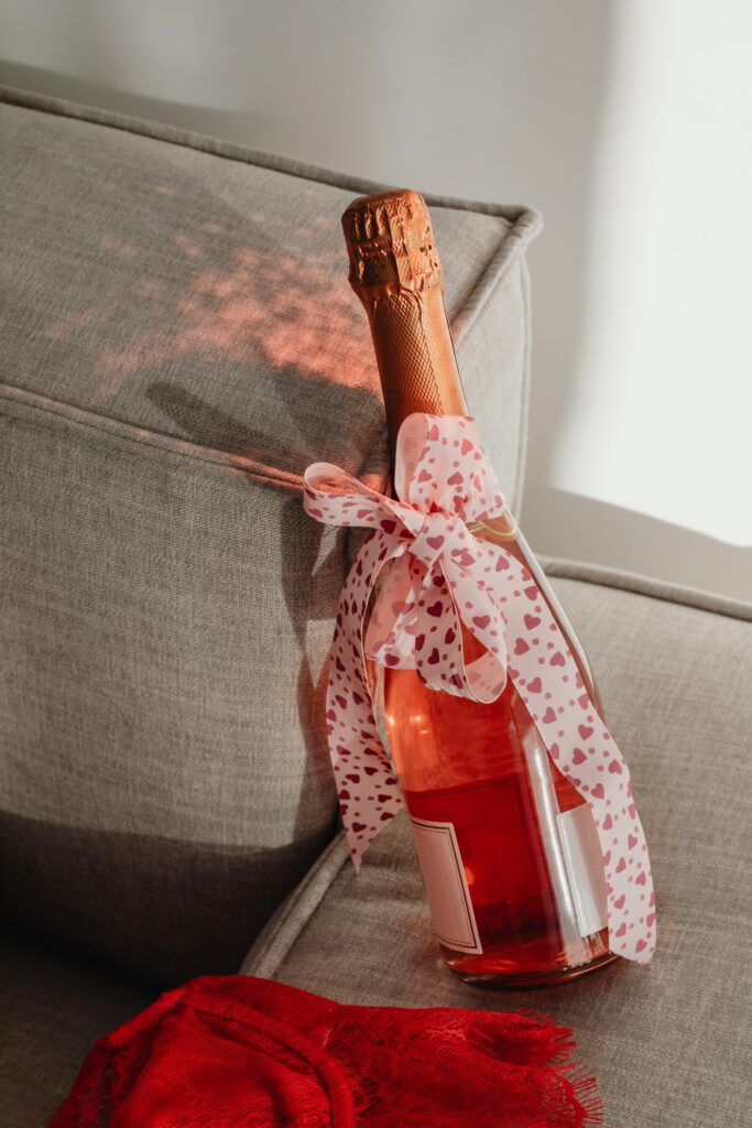  A personalized wine experience at home with premium wine gifts from winedrops representing the ultimate gift for any wine lover during a romantic Valentine's Day dinner.